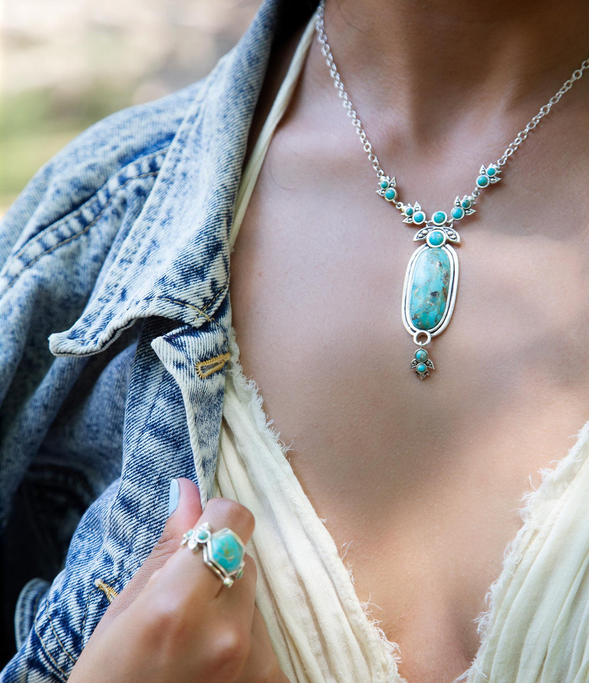 Emile Sterling Silver and Blue Turquoise Pendant Necklace