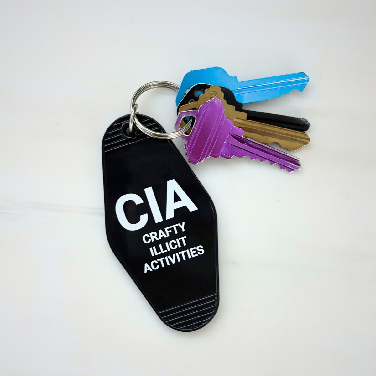 Crafty Illicit Activities Motel Style Keychain in Black