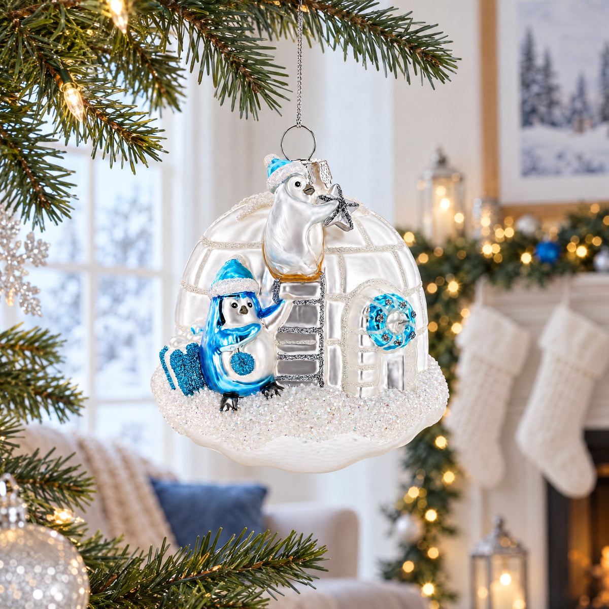 Penguins Decorating Igloo Glass Christmas Ornament